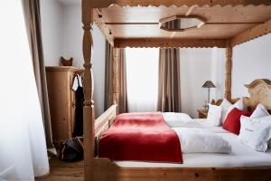 Postel nebo postele na pokoji v ubytování Gasthof-Hotel Dannerwirt
