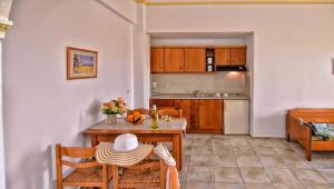 A kitchen or kitchenette at Aspri Petra Apartments
