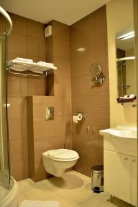 Koupelna v ubytování Hotel Mladimir