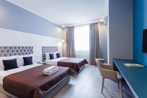 Postel nebo postele na pokoji v ubytování Partner Guest House Shota Rustaveli