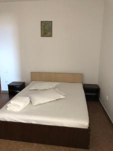 Postel nebo postele na pokoji v ubytování Vila Orient 2
