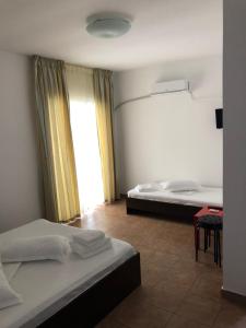 Postel nebo postele na pokoji v ubytování Vila Orient 2