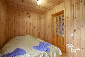 Postel nebo postele na pokoji v ubytování микуличин на долоні