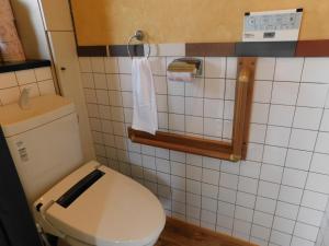 Koupelna v ubytování Guesthouse Shang
