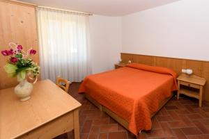 Agritur La Pieve客房内的一张或多张床位