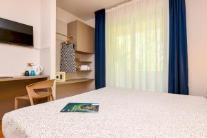 Televisyen dan/atau pusat hiburan di Hotel Riel