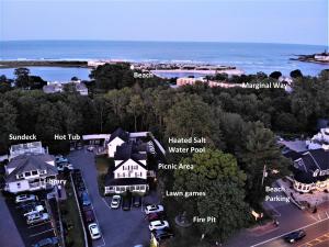 an aerial view of a house with the ocean in the background at Abalonia Inn in Ogunquit