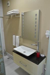 Koupelna v ubytování Miller Hotel