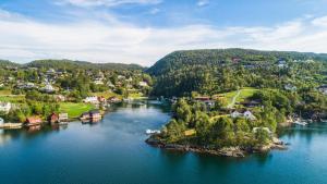 an aerial view of a small island in a river at Villa Oleanna in Lysekloster