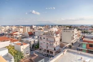 an aerial view of a city with buildings at Attic Anemoessa in Alexandroupoli