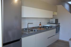 Kuchyň nebo kuchyňský kout v ubytování PACHINO - Casa nanu - un bilocale 75mq e un monolocale 40mq + 29 fotografií