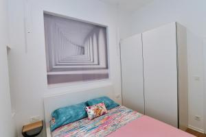 Ένα ή περισσότερα κρεβάτια σε δωμάτιο στο Vitopolis 3