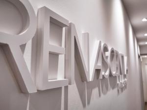 a row of letters on a wall in a room at Renascentia in Florence - Adults Only in Florence