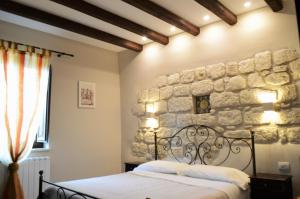 A bed or beds in a room at Il Castello