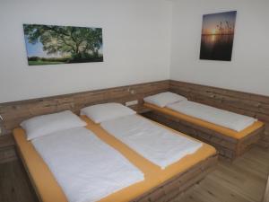 Posteľ alebo postele v izbe v ubytovaní Appartements Gotthardt