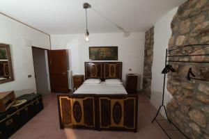 Katil atau katil-katil dalam bilik di La casa di Duilia