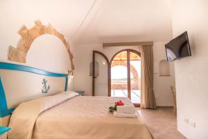Tempat tidur dalam kamar di Casa Zita Lampedusa