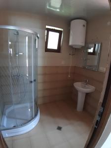 Koupelna v ubytování Hotel Niko