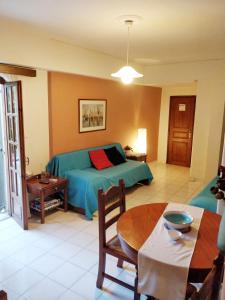 A bed or beds in a room at Alexandra Hotel