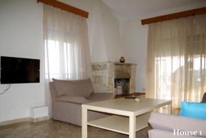 Televisyen dan/atau pusat hiburan di Lazy Cat Holiday House
