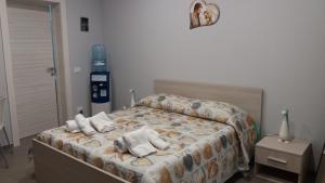 A bed or beds in a room at B&B San Francesco di Paola