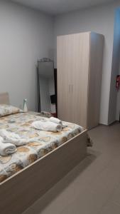 A bed or beds in a room at B&B San Francesco di Paola