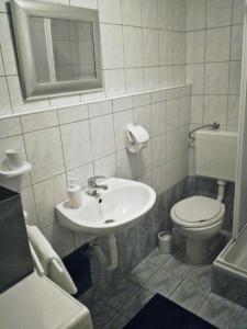 A bathroom at Apartman A&A