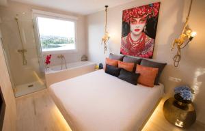 Postel nebo postele na pokoji v ubytování LOFT PLAYA SALINAS CALPE, Grupo Terra de Mar, alojamientos con encanto