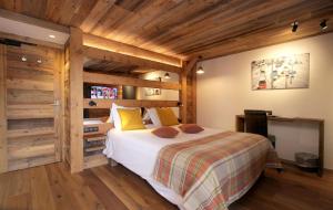 Postel nebo postele na pokoji v ubytování Hotel Cote Brune