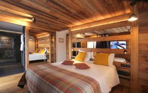 Postel nebo postele na pokoji v ubytování Hotel Cote Brune