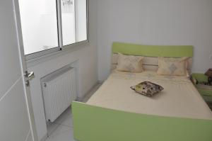 Säng eller sängar i ett rum på Apartment zone touristique 80 m beach free wifi