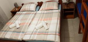 Posteľ alebo postele v izbe v ubytovaní Apartmani Lupi M&S 3