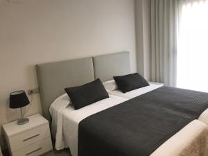 Posteľ alebo postele v izbe v ubytovaní Villa Pepita