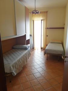 Postel nebo postele na pokoji v ubytování casa bijoux + 4 fotografie