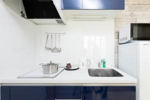 Cucina o angolo cottura di サンライズハワイ