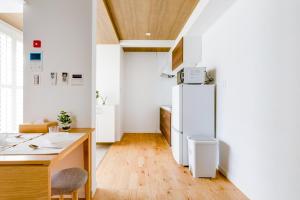 Cucina o angolo cottura di サンライズハワイ