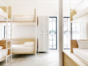 Postel nebo postele na pokoji v ubytování HOOD Hostel