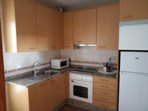 Kuchnia lub aneks kuchenny w obiekcie Apartamentos Casa Cipri