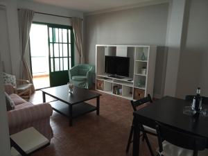 Telewizja i/lub zestaw kina domowego w obiekcie Apartamentos Casa Cipri