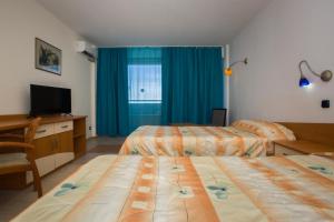 Postel nebo postele na pokoji v ubytování Royal Bay Hotel - All Inclusive + 22 fotografií