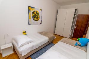 Postel nebo postele na pokoji v ubytování House Catania