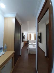 Katil atau katil-katil dalam bilik di Sara Hotel