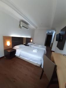 Katil atau katil-katil dalam bilik di Sara Hotel