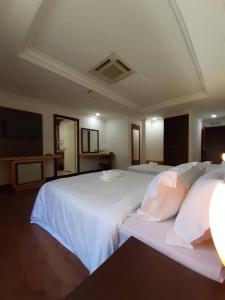 Postel nebo postele na pokoji v ubytování Sara Hotel