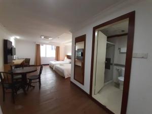 Katil atau katil-katil dalam bilik di Sara Hotel