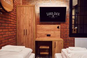 Posteľ alebo postele v izbe v ubytovaní Lord Jack Apartments