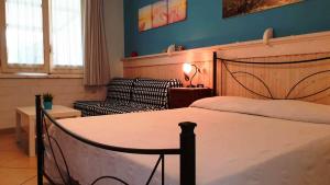 Postel nebo postele na pokoji v ubytování B&B Villa Romina + 35 fotografií