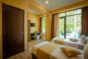 TV a/nebo společenská místnost v ubytování Hotel Comfort Tbilisi