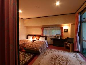 Postel nebo postele na pokoji v ubytování Hotel Mumon + 37 fotografií