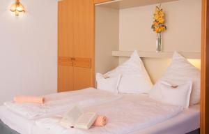 Postel nebo postele na pokoji v ubytování Hotel Der Seehof